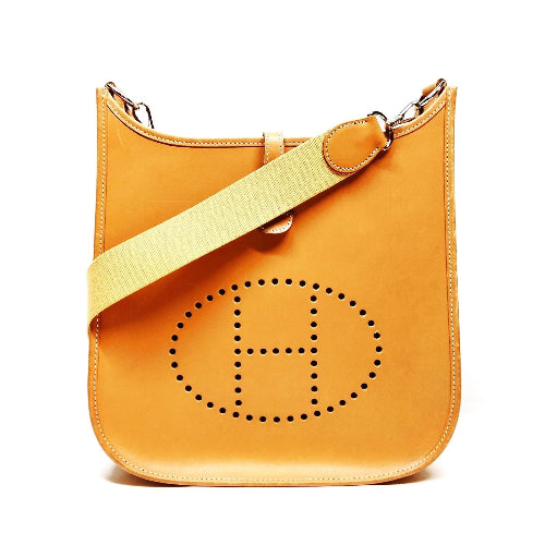 Yellow handbag with a brand logo on a white background