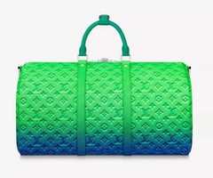 Green and blue gradient duffel bag with monogram pattern on a white background