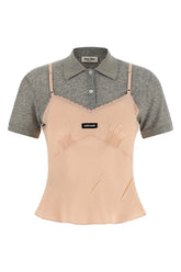 Two-tone shirt with gray and beige sections on a white background
