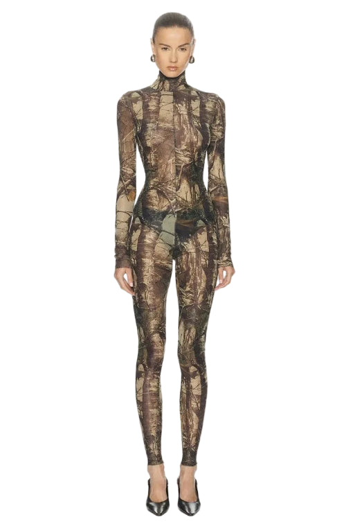 Person wearing a camouflage bodysuit on a white background