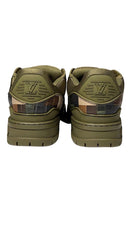 Pair of green sneakers with a brand logo on a white background