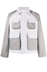 Gray and white jacket with patch pockets on a white background