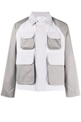 Gray and white jacket with patch pockets on a white background