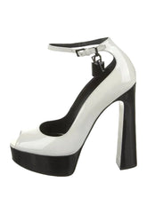 White high-heeled shoe with a black platform on a white background