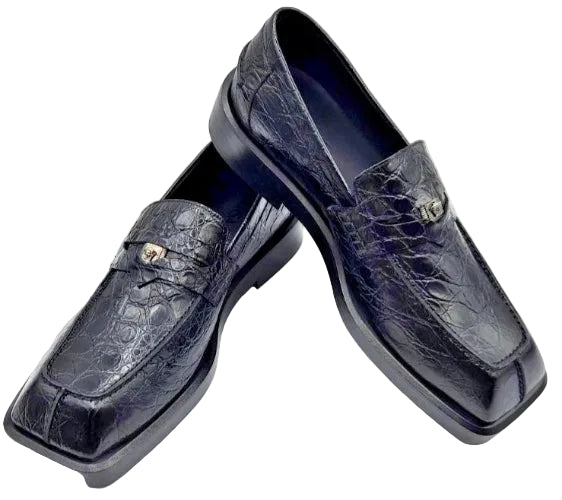 Pair of black leather shoes on a white background