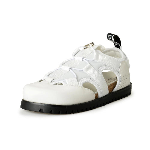White sandal with black sole on a white background