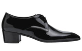 A black patent leather oxford shoe with a low block heel, shown from a side profile view against a white background.