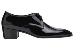 A black patent leather oxford shoe with a low block heel, shown from a side profile view against a white background.