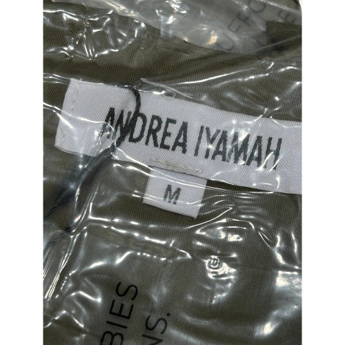 Andrea Iyamah label on a garment in clear plastic packaging