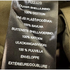 Text label on a product with material information in multiple languages.