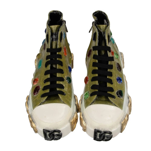 Pair of green sneakers with colorful speckles on a white background