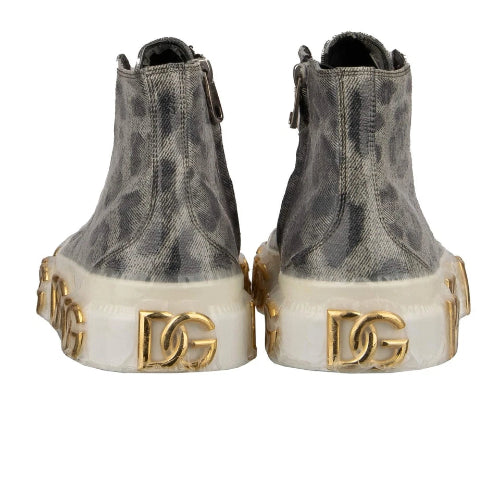 Gray high-top sneakers with gold 'DG' logo on white sole against a white background