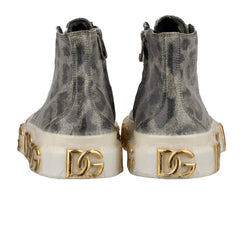 Gray high-top sneakers with gold 'DG' logo on white sole against a white background