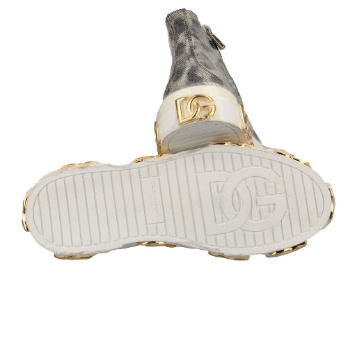 White sneaker with gold accents on a white background