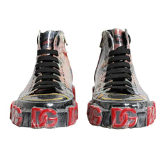 Pair of high-top sneakers with transparent soles and red and black text on a white background