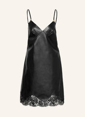 Black slip dress with lace hem on a white background