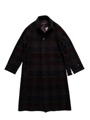 Plaid coat on a beige background