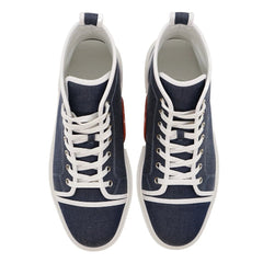 A pair of high-top canvas sneakers shown from a top-down view. The shoes feature a dark blue denim-like upper, white laces, white trim around the toe and collar, and a white rubber sole.