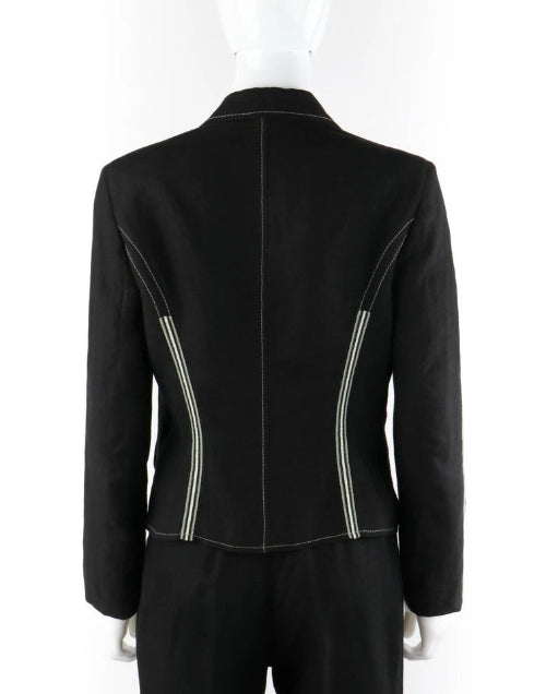 A black leather jacket with silver zipper accents on the sides, shown on a headless mannequin against a white background.