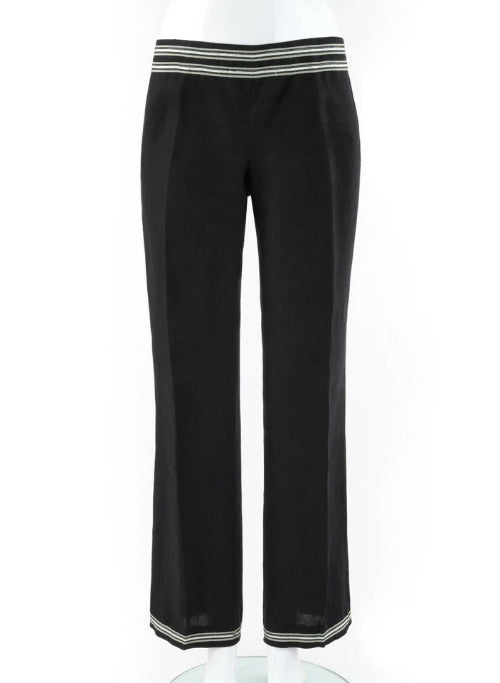Black wide-leg cropped pants with contrasting striped trim at the elastic waistband and the lower hems, displayed on a white mannequin against a white background.