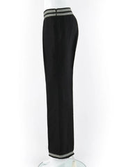 Blue jeans on a mannequin against a white background