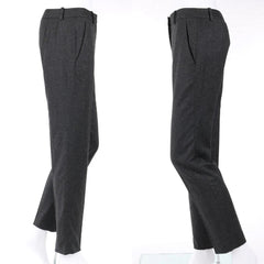 A pair of dark charcoal gray tailored trousers shown from two angles on white mannequin legs against a plain white background.