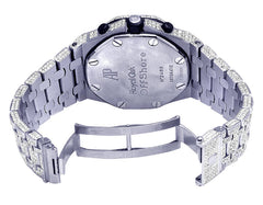Silver watch with a detailed face on a white background