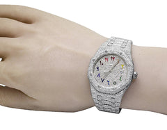 Silver watch with colorful accents on a wrist against a white background