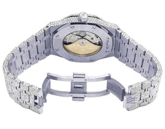 Luxury watch with intricate design and visible mechanical components on a white background