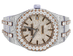 Luxury diamond-encrusted watch on a white background