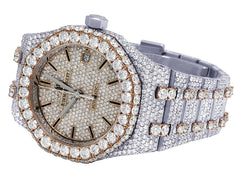 Luxury watch with diamond-studded case and band on a white background