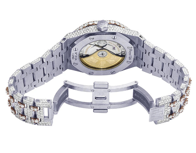 Luxury watch with diamond-studded band on a white background