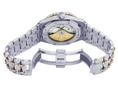 Luxury watch with diamond-studded band on a white background