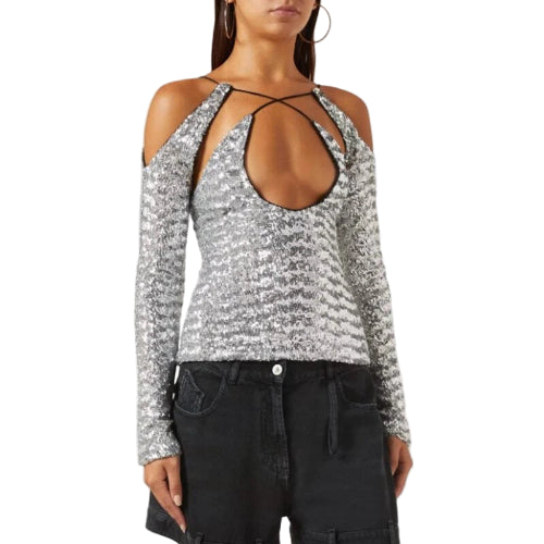 Silver sequin top with cut-out design worn by a model on a white background
