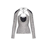 Silver sequin top with long sleeves on a white background