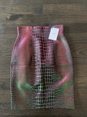 Mesh bag with a gradient pattern on a wooden surface