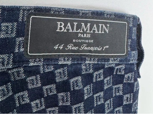 Balmain label on a patterned fabric background