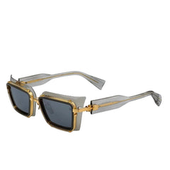 Gold-framed sunglasses on a white background