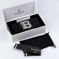 Balmain Paris belt buckle set with packaging on a white background