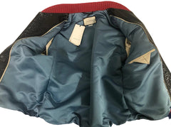 Blue jacket with a brand tag on a white background
