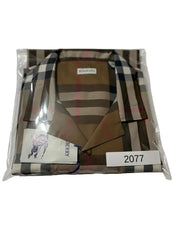 A vintage Burberry necktie in the iconic brown, beige, and black check pattern, sealed in its original clear plastic packaging with a white paper label.