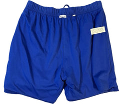 Blue shorts with tags on a light gray background