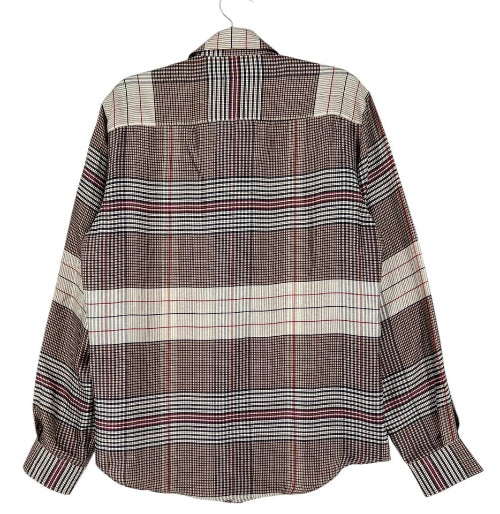 A long-sleeve plaid button-up shirt in brown, beige, and white, hanging on a white hanger against a plain white background.