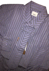 A close-up of a purple and white vertically striped button-down shirt, showing the collar and fabric texture.
