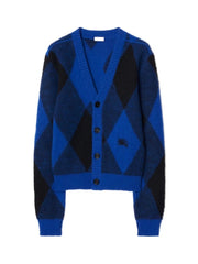 Blue and black argyle pattern cardigan on a white background