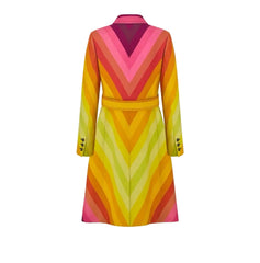 A long-sleeve belted coat with a vibrant chevron pattern in shades of yellow, orange, pink, and green, shown from the back on a light gray background.