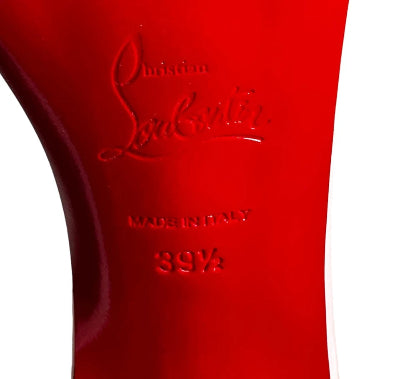 Close-up of a red shoe sole with 'Christian Louboutin' branding and size '39.5'.