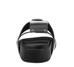 Black sandal with a metallic buckle on a white background
