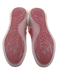 A pair of red and white sneakers shown from the bottom, displaying the custom embossed 'Bastille' logo on the soles.