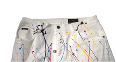 White denim jeans with colorful paint splatter and drip designs, shown against a plain gray background.